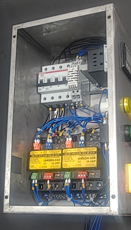 Forward/reverse motor control panel wired by INSYS